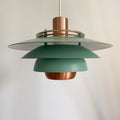 Mørkegrøn og kobber lampe